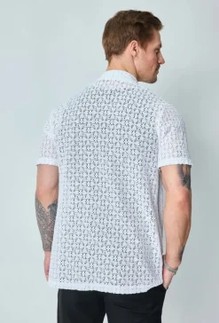 Chemise unie en dentelle manches courtes col à revers
