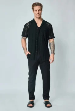 Chemise unie en dentelle manches courtes col à revers