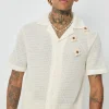 Chemise unie manches courtes