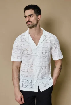 Chemise unie manches courtes à motifs