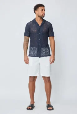 Chemise unie manches courtes