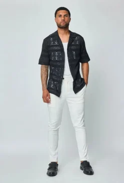 Chemise unie manches courtes à motifs