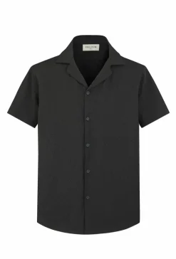 Chemise unie manches courtes à motifs géométriques