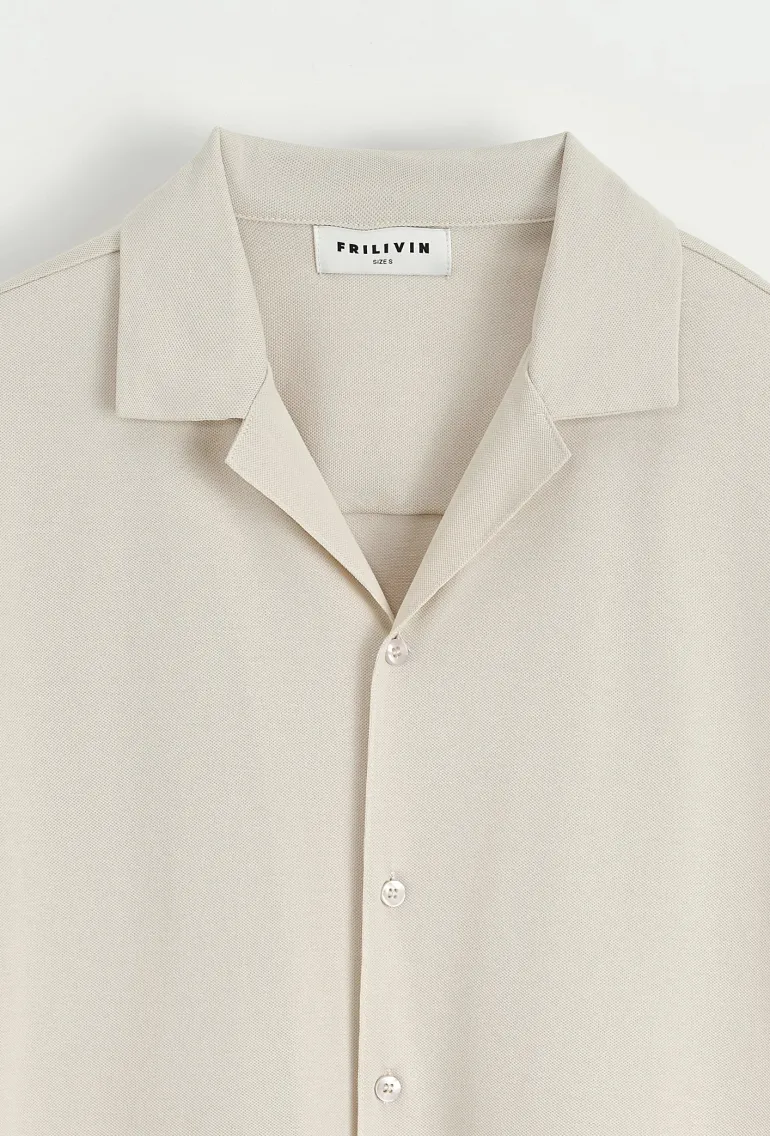 Chemise unie manches courtes