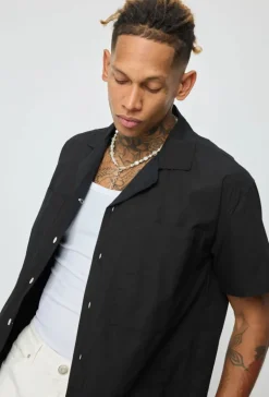 Chemise unie manches courtes