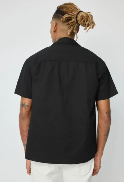 Chemise unie manches courtes