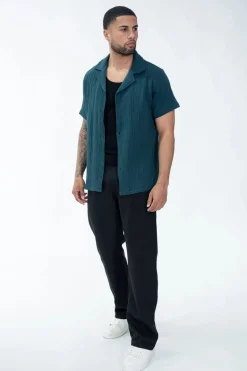 Chemise unie manches courtes