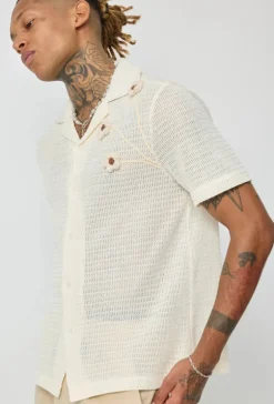 Chemise unie manches courtes