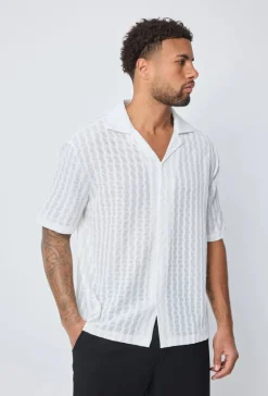 Chemise unie manches courtes à boutons