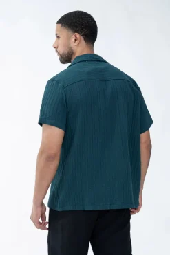 Chemise unie manches courtes