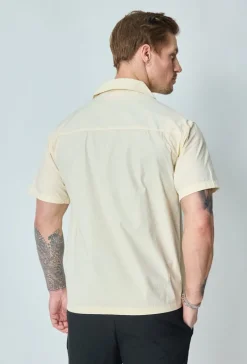 Chemise unie manches courtes