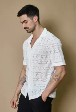 Chemise unie manches courtes à motifs