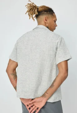 Chemise unie manches courtes