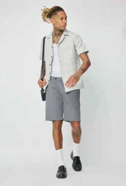 Chemise unie manches courtes