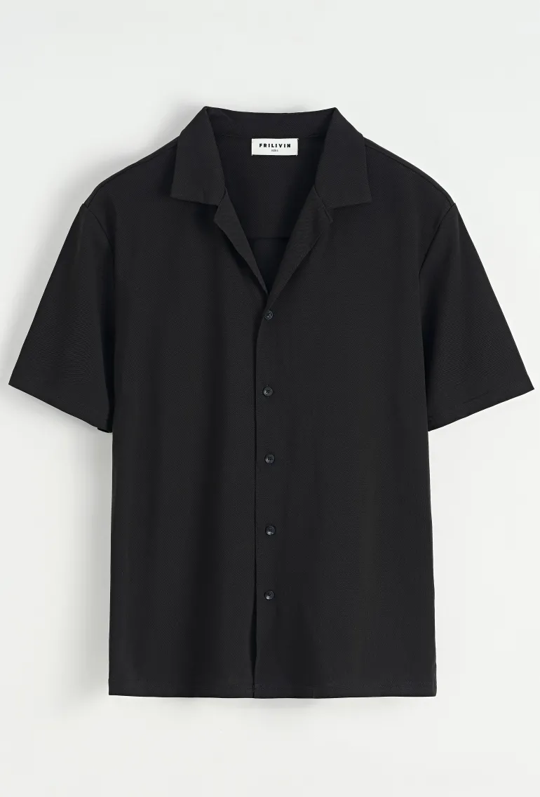 Chemise unie manches courtes