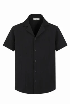 Chemise unie manches courtes