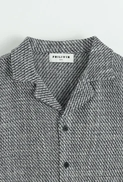 Chemise unie manches courtes