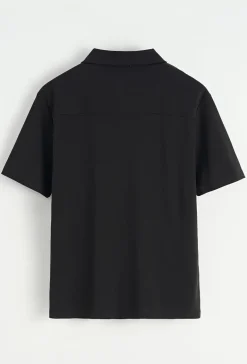 Chemise unie manches courtes