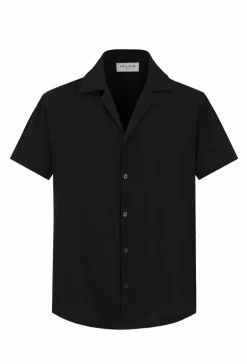 Chemise unie manches courtes