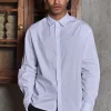 Chemise unie manches longues