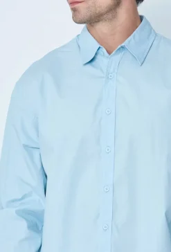 Chemise unie manches longues