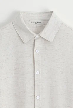 Chemise unie manches longues