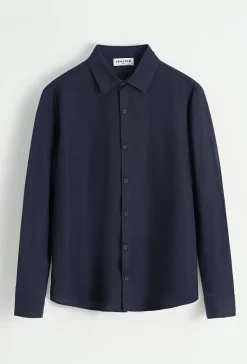 Chemise unie manches longues