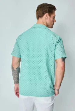 Chemise unie trouée manches courtes