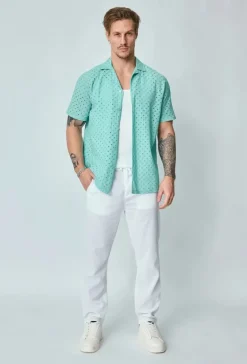 Chemise unie trouée manches courtes