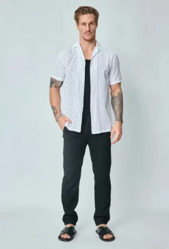 Chemise unie trouée manches courtes