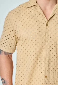 Chemise unie trouée manches courtes