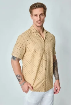 Chemise unie trouée manches courtes
