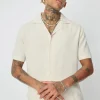 Ensemble chemise à manches courtes et pantalon uni