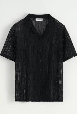Ensemble chemise et short unis à rayures