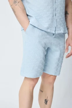 Ensemble chemise et short uni à motif