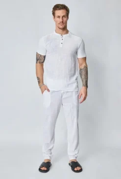 Ensemble polo pantalon uni effet lin