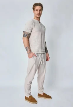 Ensemble polo pantalon uni effet lin