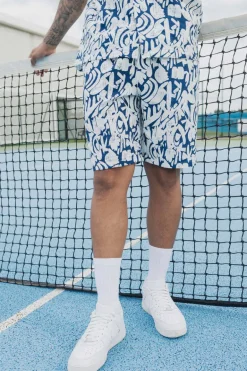 Ensemble short et chemise a motifs abstraits