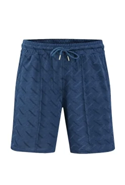 Ensemble short polo à motif géométriques