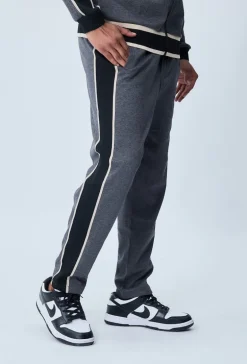 Ensemble sportwear veste et jogging à bandes latérales