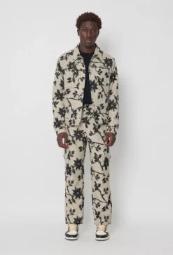 Ensemble veste pantalon à motif feuillage