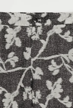 Ensemble veste pantalon à motif feuillage