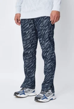 Jean large à motifs damier avec fentes