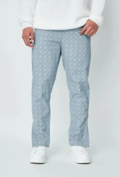 Jean large à motifs damier avec fentes