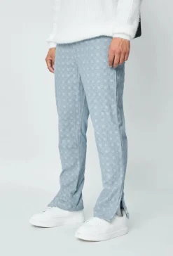 Jean large à motifs damier avec fentes