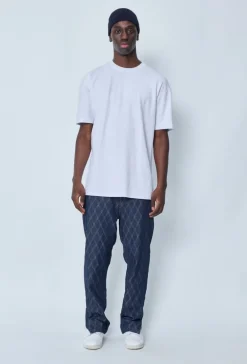 Jean large à motifs damier avec fentes
