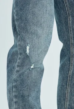 Jean regular fit effet déchiré et délavé