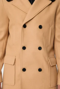 Manteau boutonné col à fourrure