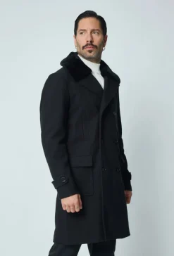 Manteau boutonné col à fourrure