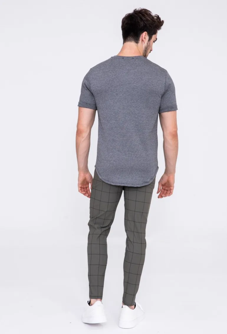 Pantalon à carreaux : style tendance pour homme